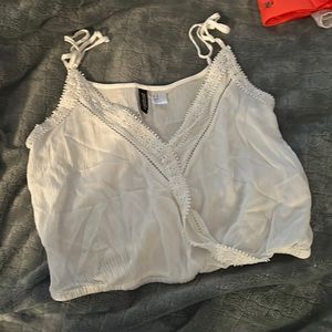 White tank and black shorts